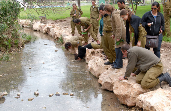 Ein Harod with soldiers drinking