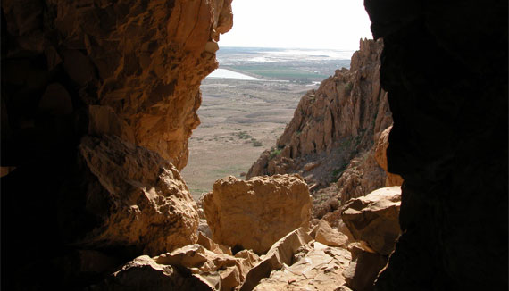 Qumran Cave 1 entrance with the Dead Sea below